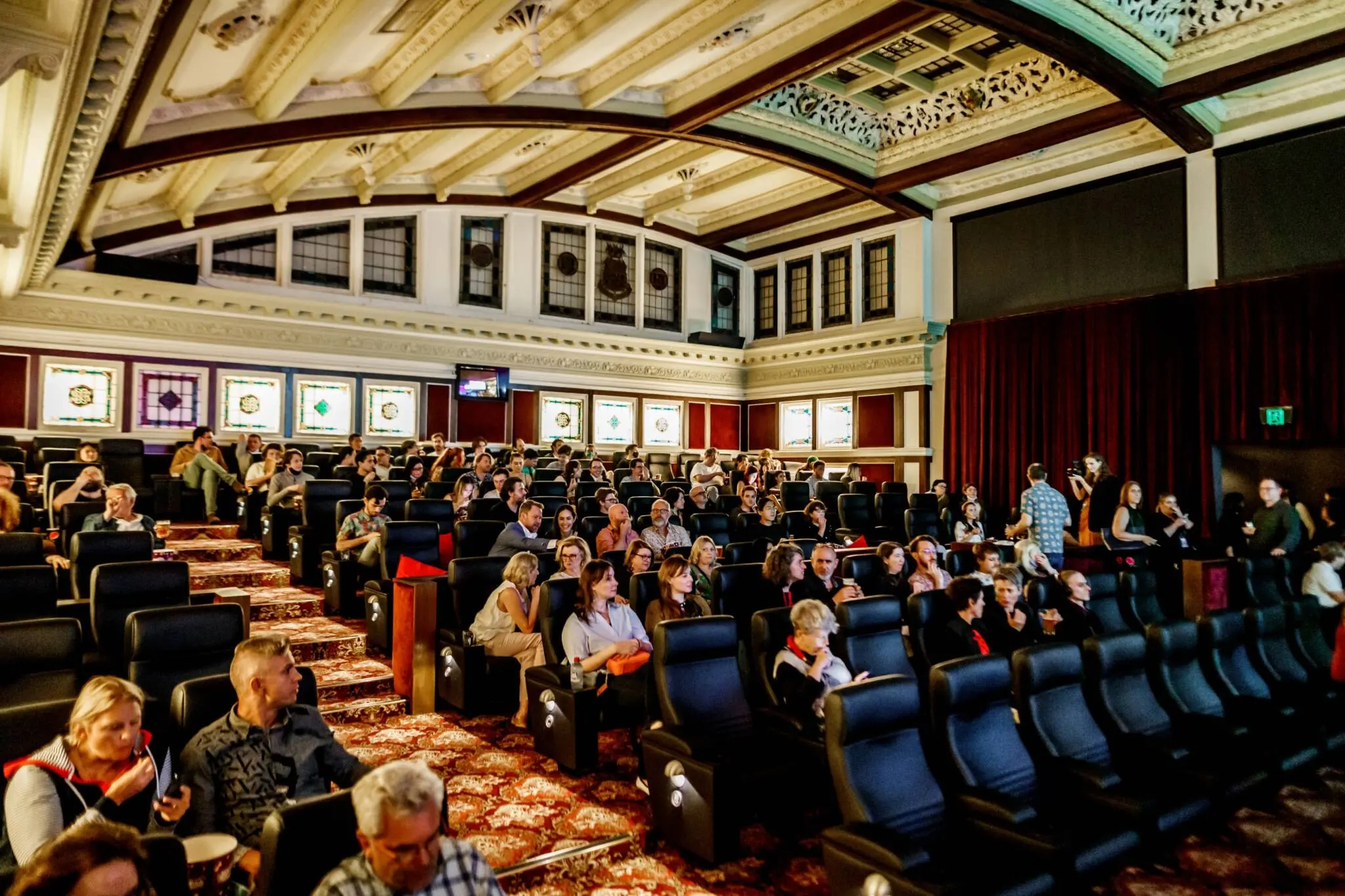 Audience enjoying a film screening at the Brisbane International Film Festival